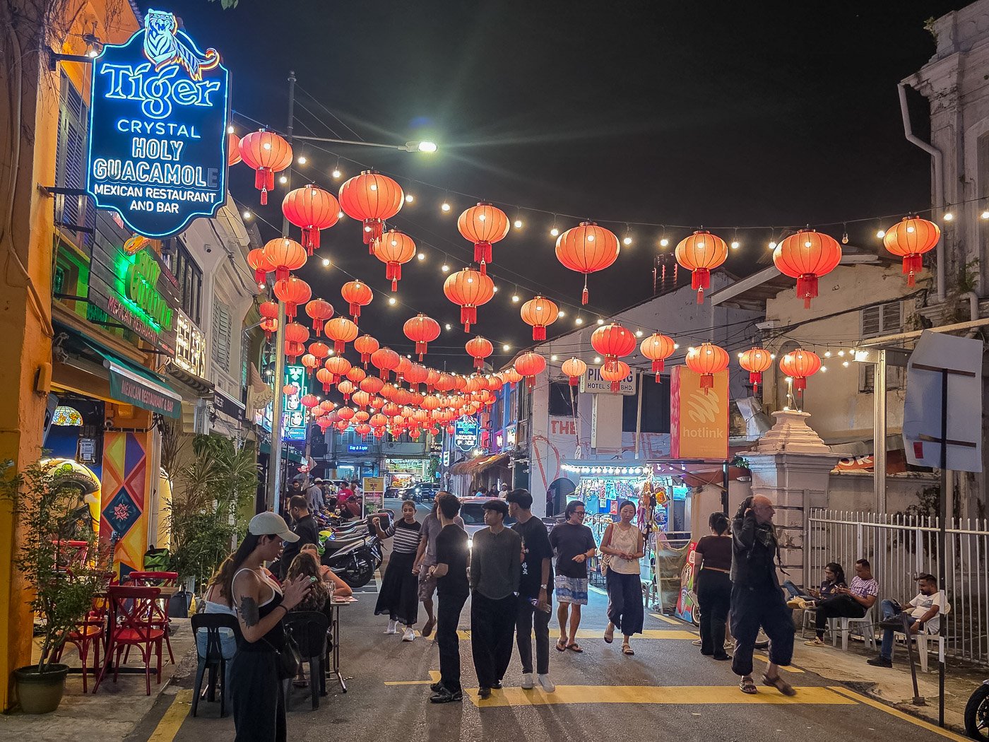 Blurred crowd scene with layered human movement, representing overlapping signals and lack of clear focus