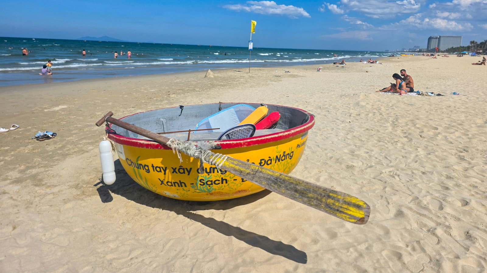 Vietnamese beach rescue boat on the sand, symbolizing responsibility, freedom, and personal accountability.